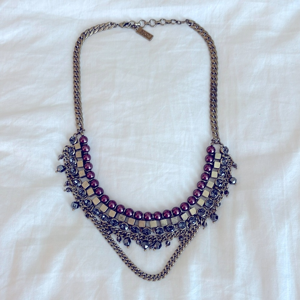 Silpada’s K&R brass necklace.
